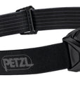 Side view of the PETZL ARIA® 2 RGB headlamp in camo, highlighting the single button for quick selection of brightness and light color. (8749916586221)