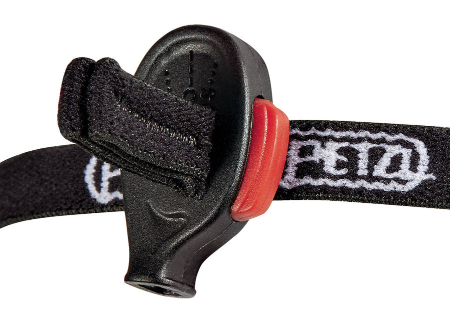 Side view of the PETZL e+LITE® headlamp, demonstrating the adjustable headband, lightweight design, and the included carrying case for long-term storage. (8749904625901)