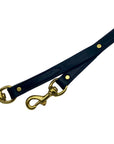 Leather Ravenox Leather Safety Dog Leash in black, coiled inside a heavy-duty storage box, ready for easy attachment and deployment. (8660536590573)