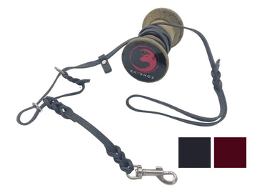 Swatch image of the Ravenox Artisan Leather Dog Training Halter & Leash in black leather with solid brass hardware, showcasing the durable braided ends and high-quality craftsmanship. (8654973468909)