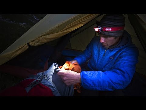 YouTube video explaining how to choose the energy source for your headlamp with PETZL's HYBRID Concept, detailing the use of AAA batteries and the CORE rechargeable battery for optimal lighting performance.