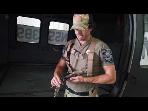 YouTube video demonstrating the use of the Special Forces Full Body SPIE Harness, including setup, secure attachment, and operation during insertion and extraction missions.